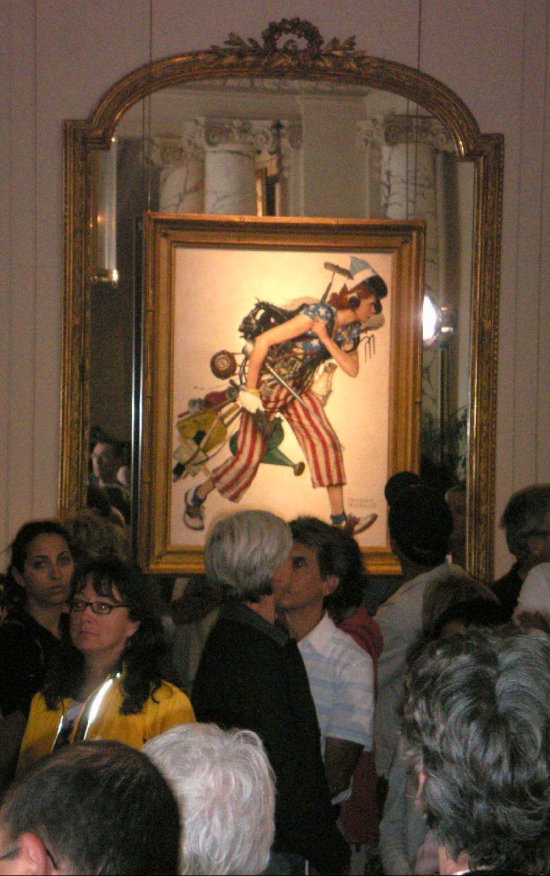 Visitors in front of Norman Rockwell's Miss Liberty